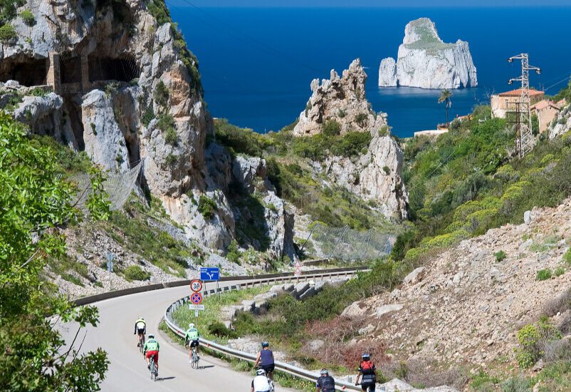 Downhill to Masua Pan di Zucchero in a bike tour in Sardinia